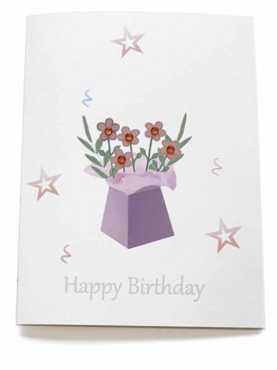 Flowers and fern in a gift box, birthday card