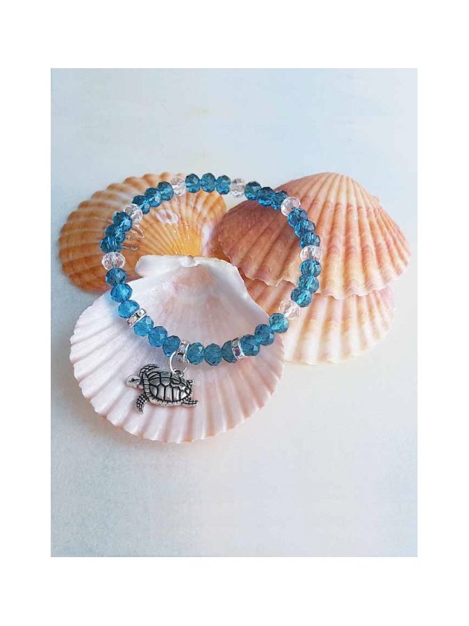 Blue glass bead stretch bracelet with sea turtle charm